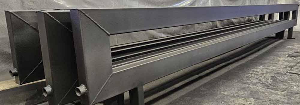 Батареї з труб – рішення для опалення промислових приміщень